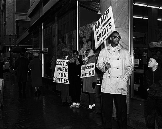 NAACP members picketing outside Woolworth's in 1960
