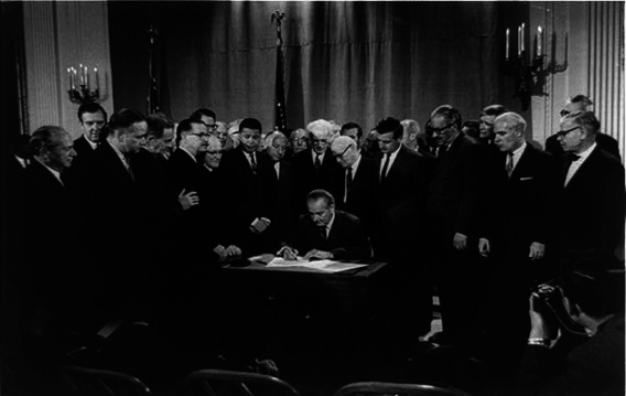 President Johnson signing the Civil Rights Bill, April 11, 1968