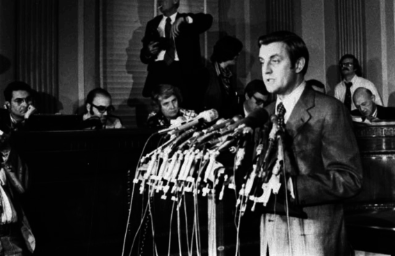 Senator Walter Mondale at microphones announcing his decision not to run for president in the 1976 election