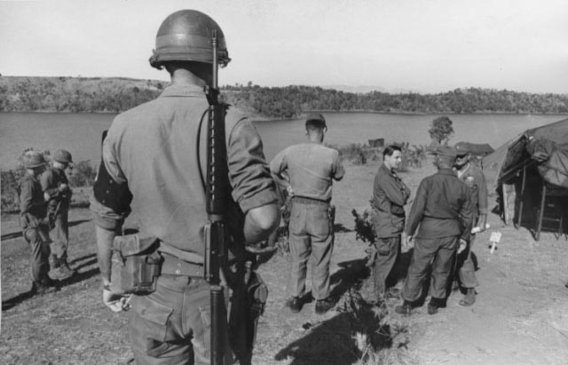 Senator Mondale visiting U.S. infantry camp in Southeastern Vietnam