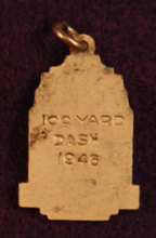 Back of medal etched with: "100 Yard Dash 1946"