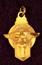 Gold Medal with eagle and the word "Activities"